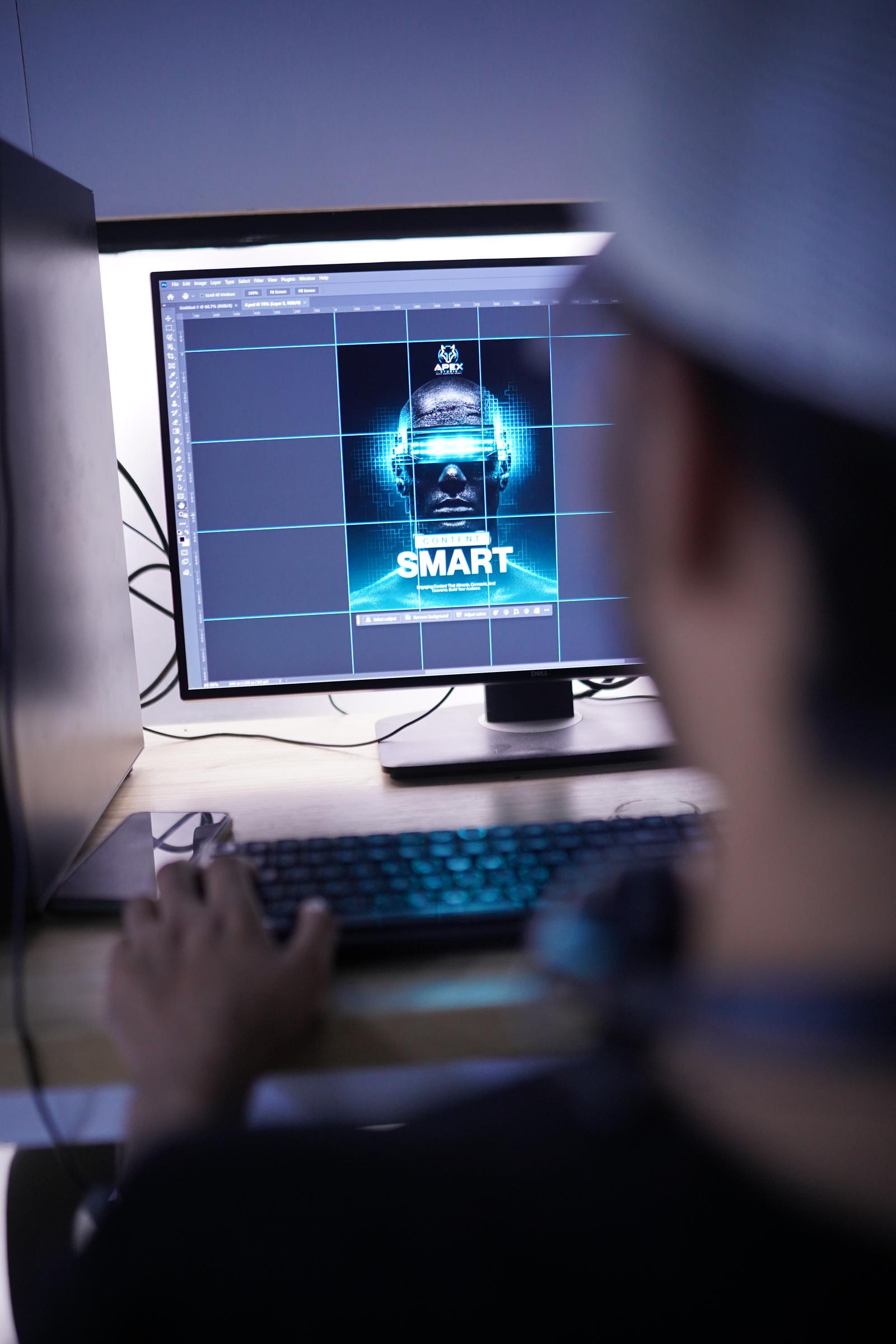 A WorkX member working on marketing content at the design corner