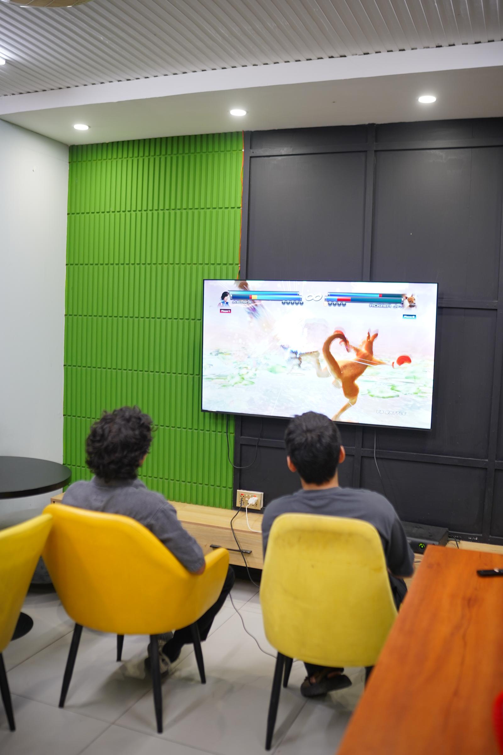 Founders taking a break in the WorkX gaming lounge